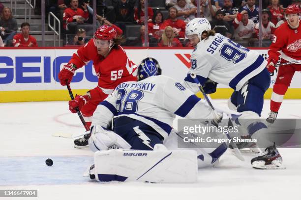 Tyler Bertuzzi of the Detroit Red Wings scores a second period gaol past Andrei Vasilevskiy of the Tampa Bay Lightning at Little Caesars Arena on...