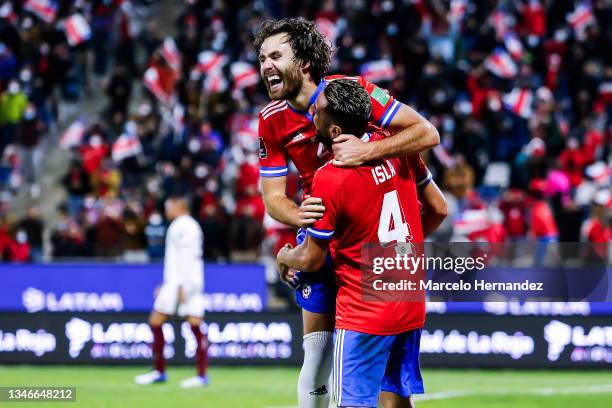 Ben Brereton of Chile celebrates with Mauricio Isla after scoring his team's third goalduring a match between Chile and Venezuela as part of South...