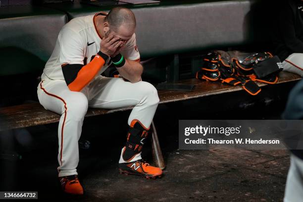 Evan Longoria of the San Francisco Giants reacts after losing to the Los Angeles Dodgers 2-1 in game 5 of the National League Division Series at...