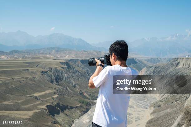Photographer Back Photographer Back View Photos and Premium High Res Pictures - Getty Images