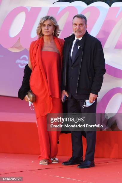 Italian television journalist Myrta Merlino and partner former soccer coach Marco Tardelli at Rome Film Fest 2021. The Eyes of Tammy Faye Red Carpet....