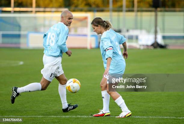Benjamin Nivet, Laure Boulleau of VCF during the charity football match between Varietes Club de France and CHI PSG , to benefit 'Fondation des...