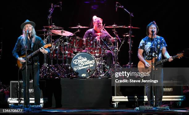 Patrick Simmons and Tom Johnston of The Doobie Brothers perform on the 50th Anniversary Tour at Toyota Amphitheatre on October 14, 2021 in Wheatland,...