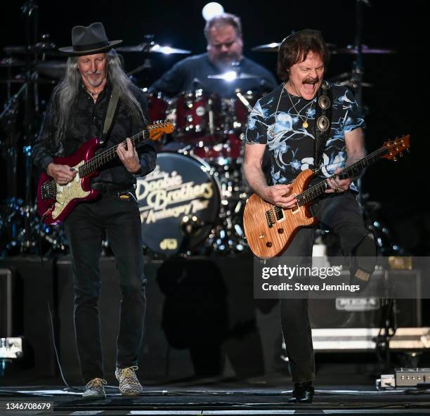 Patrick Simmons and Tom Johnston of The Doobie Brothers perform on the 50th Anniversary Tour at Toyota Amphitheatre on October 14, 2021 in Wheatland,...