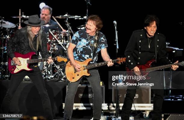 Patrick Simmons, Tom Johnston and John McFee of The Doobie Brothers perform on the 50th Anniversary Tour at Toyota Amphitheatre on October 14, 2021...