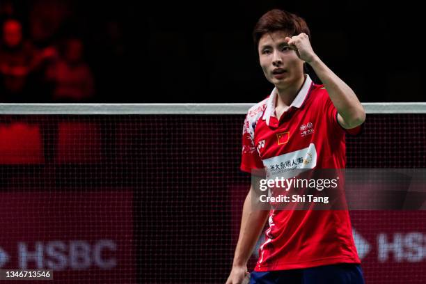 Shi Yuqi of China celebrates the victory in the Men's Single match against Kantaphon Wangcharoen of Thailand during day seven of the Thomas & Uber...