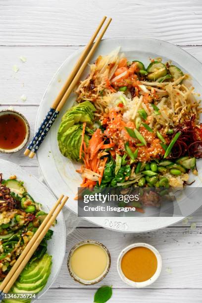 poke bowl - salad dressing stock pictures, royalty-free photos & images
