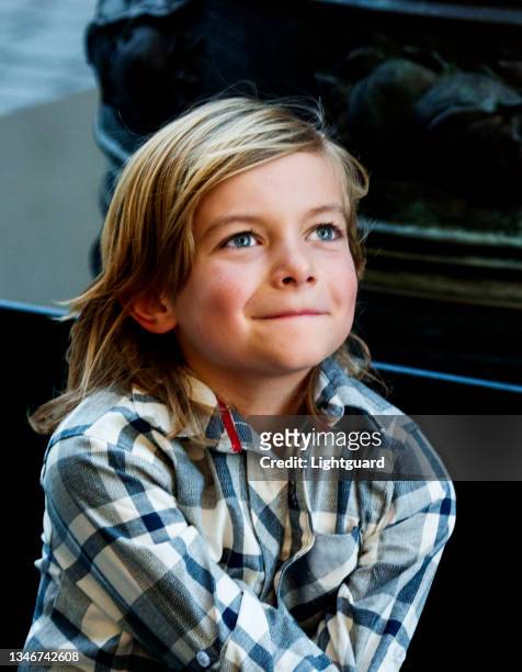 mischievous boy 2 - boy with long hair stock pictures, royalty-free photos & images