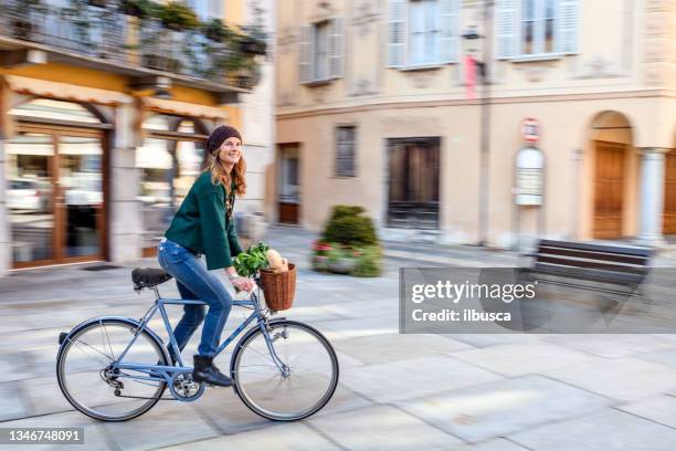 tourist in italian town, varallo, piedmont - buying a bike bildbanksfoton och bilder