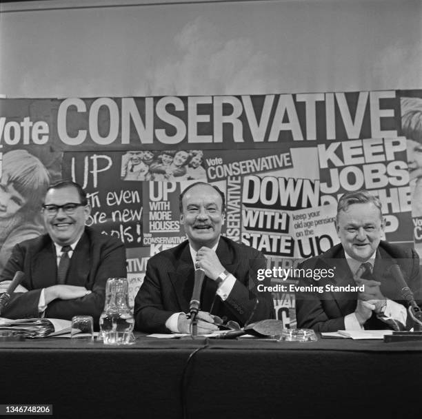 From left to right, British Conservative politicians Reginald Maudling , John Hare, 1st Viscount Blakenham and Quintin Hogg at a party press...