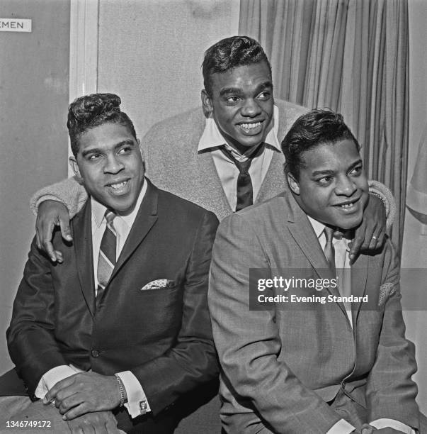 American vocal trio the Isley Brothers, UK, 24th October 1964. From left to right, they are brothers Rudolph Isley, Ronald Isley and O'Kelly Isley Jr.