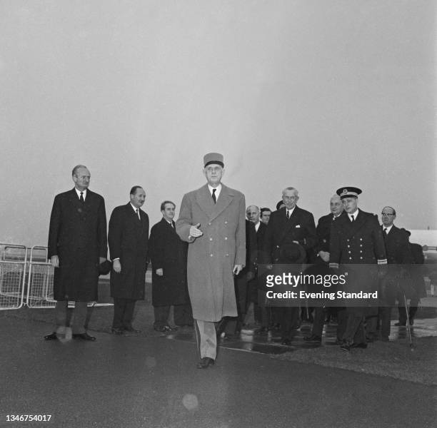 Charles de Gaulle , the President of France, arrives at London Airport to attend the state funeral of former British Prime Minister Winston...