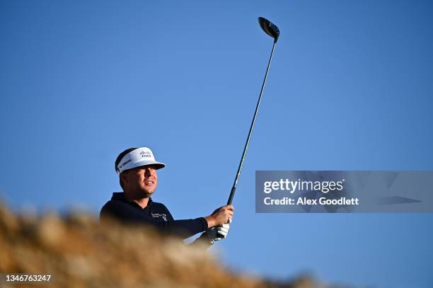 Keith Mitchell of the United States watches his shot on the first tee during the second round of THE CJ CUP @ SUMMIT at The Summit Club on October...