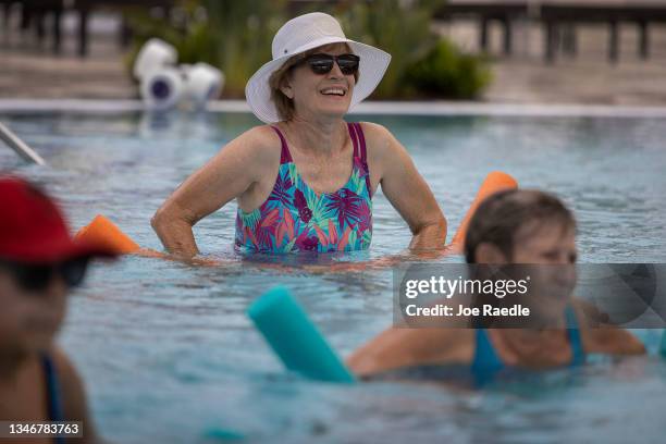 Jackie Bayer participates in a water aerobics class in the John Knox Village Continuing Care Retirement Community pool, where he resides on October...