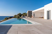 Luxury minimalist house with swimming pool and beautiful sea view.