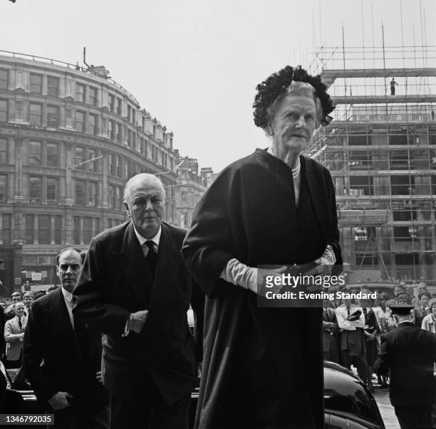 Lady Clementine Churchill and her son Randolph Churchill attend a memorial service for newspaper publisher Max Aitken, Lord Beaverbrook, at St Paul's...