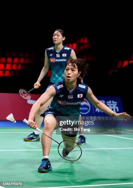 Yuki Fukushima and Mayu Matsumoto of Japan compete in the Uber Cup Semi Final Women's Double match against Lee Sohee and Shin Seungchan of Korea...