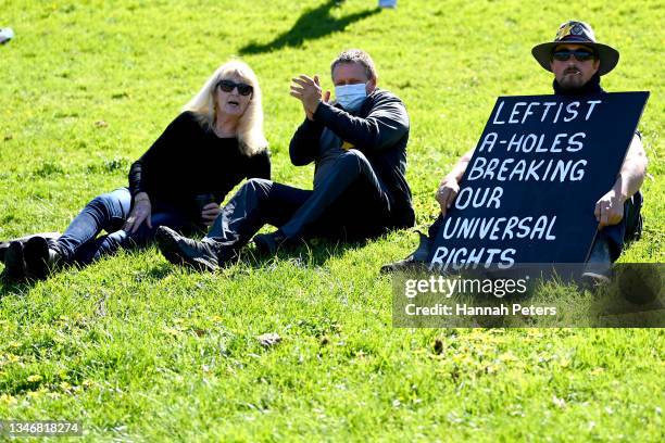 People gather to protest in Auckland Domain on October 16, 2021 in Auckland, New Zealand. Anti-vaccination activists have organised rallies across...