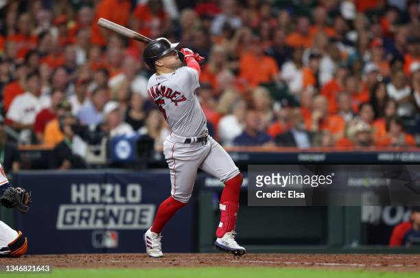 Enrique Hernandez of the Boston Red Sox hits a home run in the third inning against the Houston Astros during Game One of the American League...