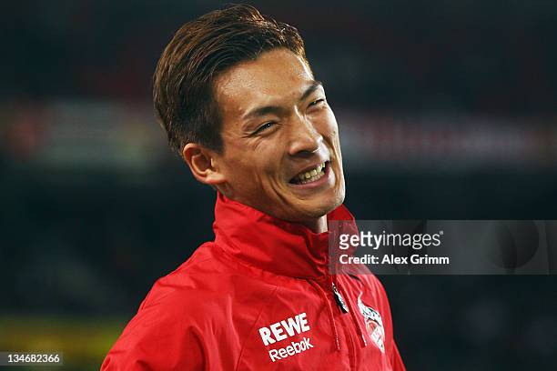 Tomoaki Makino of Koeln smiles prior to the Bundesliga match between VfB Stuttgart and 1. FC Koeln at Mercedes-Benz Arena on December 3, 2011 in...
