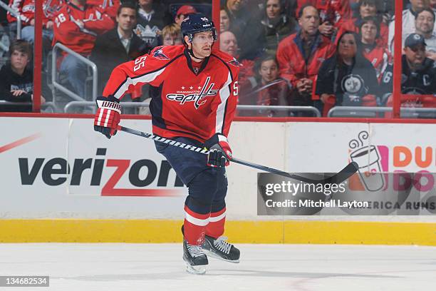 Jeff Schultz of the Washington Capitals looks on during a NHL hockey game against the Winnipeg Jets on November 23, 2011 at the Verizon Center in...