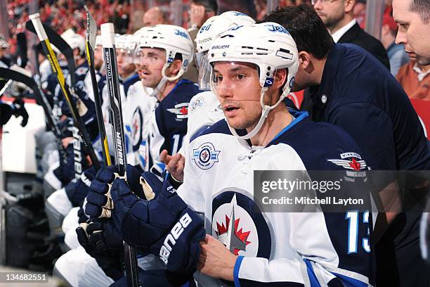 Kyle Wellwood of the Winnipeg Jets looks on during a NHL hockey game against the Washington Capitals on November 23, 2011 at the Verizon Center in...