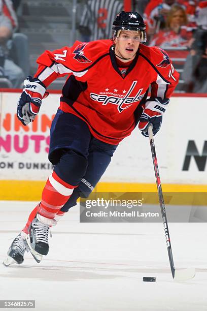 John Carlson of the Washington Capitals skates with the puck during a NHL hockey game against the Winnipeg Jets on November 23, 2011 at the Verizon...