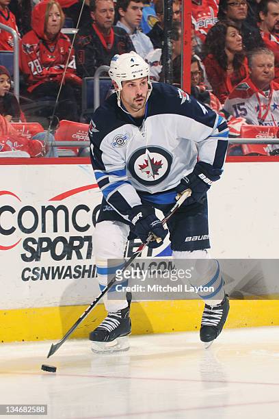 Zach Bogosian of the Winnipeg Jets skates with the puck during a NHL hockey game against the Washington Capitals on November 23, 2011 at the Verizon...