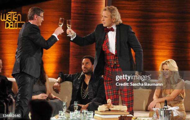 Guenther Jauch and Thomas Gottschalk drink on Jauch's promise to think over succeeding Thomas Gottschalk in his role as host during the 199th "Wetten...