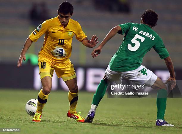 Edson Puch of Al Wasl and Walid Abbas of Al Shabab in action during the Etisalat League match between Al Wasl and Al Shabab at Zabeel Stadium on...