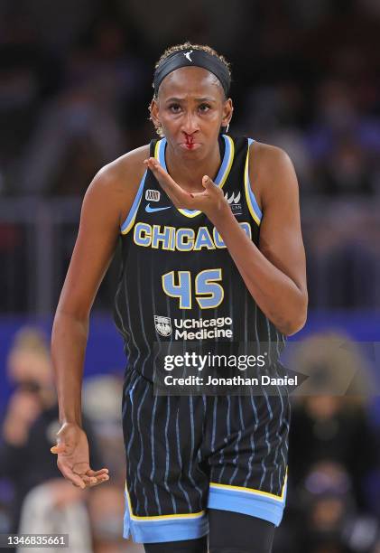 Astou Ndour-Fall of the Chicago Sky reacts after a Phoenix Mercury player bloodied her nose during Game Three of the 2021 WNBA Finals at Wintrust...