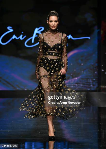 Model walks the runway during Eni Buiron FEMME At Los Angeles Fashion Week Powered By Art Hearts Fashion on October 15, 2021 in Los Angeles,...