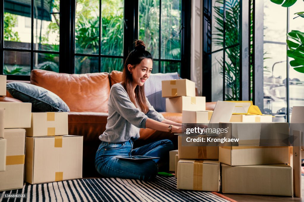 Shopping online with laptop at home.