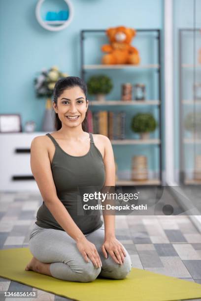 beautiful attractive young woman doing yoga exercising at home, health concept, fitness concept, stock photo - upright position stock pictures, royalty-free photos & images