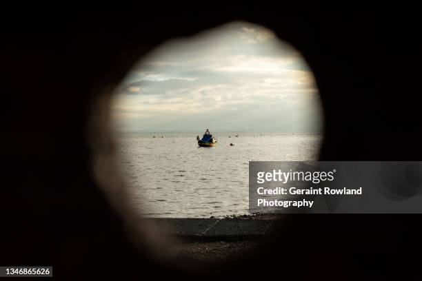 peephole to sea, south east england - peephole stock pictures, royalty-free photos & images