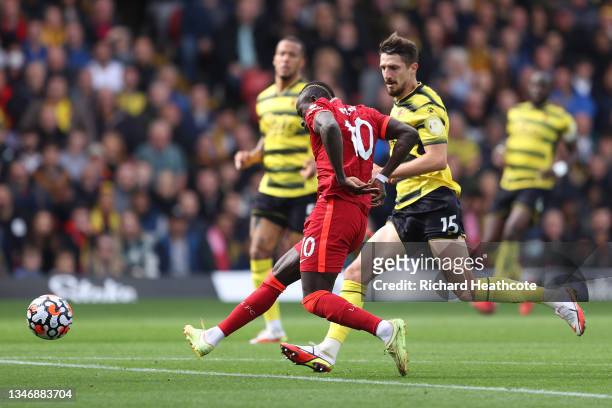 Sadio Mane of Liverpool scores their side's first goal during the Premier League match between Watford and Liverpool at Vicarage Road on October 16,...