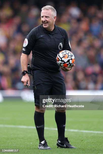 Match referee, Jonathan Moss looks on during the Premier League match between Watford and Liverpool at Vicarage Road on October 16, 2021 in Watford,...