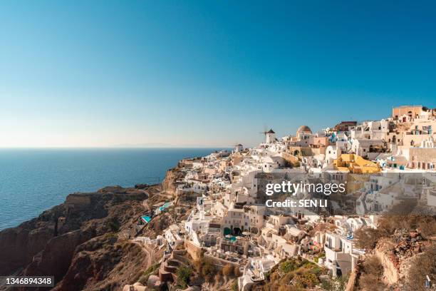 sunset landscapes of the village oia in santorini island in greece - oia santorin stock-fotos und bilder