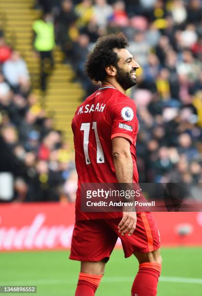 Mohamed Salah of Liverpool celebrates after scoring the fourth goal during the Premier League match between Watford and Liverpool at Vicarage Road on...
