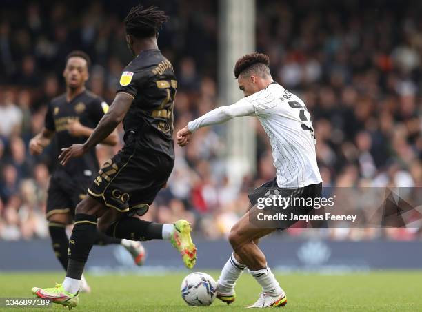 Antonee Robinson of Fulham scores their team's fourth goal during the Sky Bet Championship match between Fulham and Queens Park Rangers at Craven...