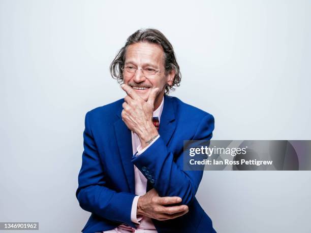 professor/scientist with wild hair and bowtie - crazy professor stockfoto's en -beelden