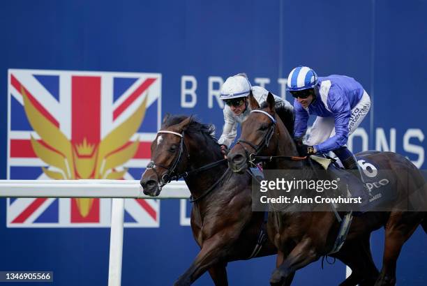 Jim Crowley riding Baaeed win The Queen Elizabeth II Stakes during the Qipco British Champions Day at Ascot Racecourse on October 16, 2021 in Ascot,...