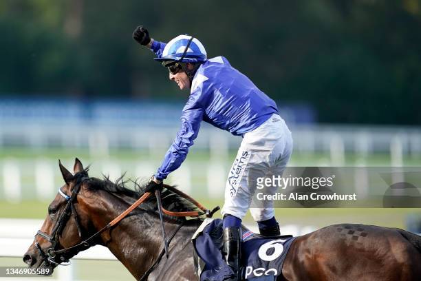 Jim Crowley riding Baaeed celebrate winning The Queen Elizabeth II Stakes during the Qipco British Champions Day at Ascot Racecourse on October 16,...