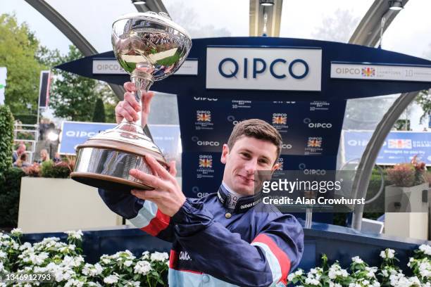 Oisin Murphy celebrates becoming Champion jockey during the Qipco British Champions Day at Ascot Racecourse on October 16, 2021 in Ascot, England.