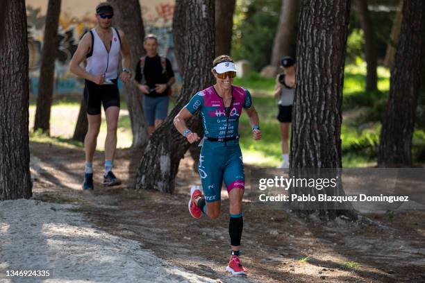 Lisa Norden of Sweden competes in the run leg of Ironman Mallorca on October 16, 2021 in Mallorca, Spain.