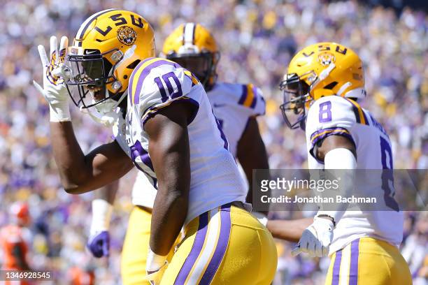 Jaray Jenkins of the LSU Tigers celebrates a touchdown with teammates during the first half against the Florida Gators at Tiger Stadium on October...