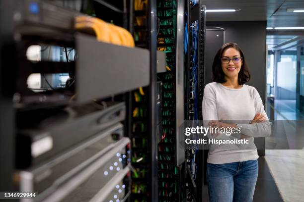 it support technician working at a server room at the office - server engineer stock pictures, royalty-free photos & images