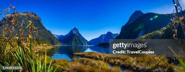 milford sound, new zealand. mitre peak is the iconic landmark of milford sound in fiordland national park, south island of new zealand. - mitre peak stock pictures, royalty-free photos & images
