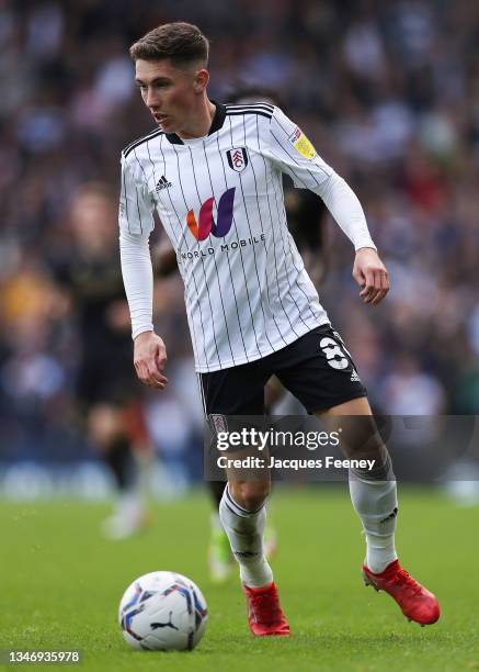 Harry Wilson of Fulham runs with the ball during the Sky Bet Championship match between Fulham and Queens Park Rangers at Craven Cottage on October...