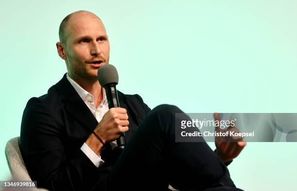 Benedikt Hoewedes, former palyer of Gerrmany talks during the Club 100 Awarding Ceremony at Deutsches Fussball Museum on October 16, 2021 in...